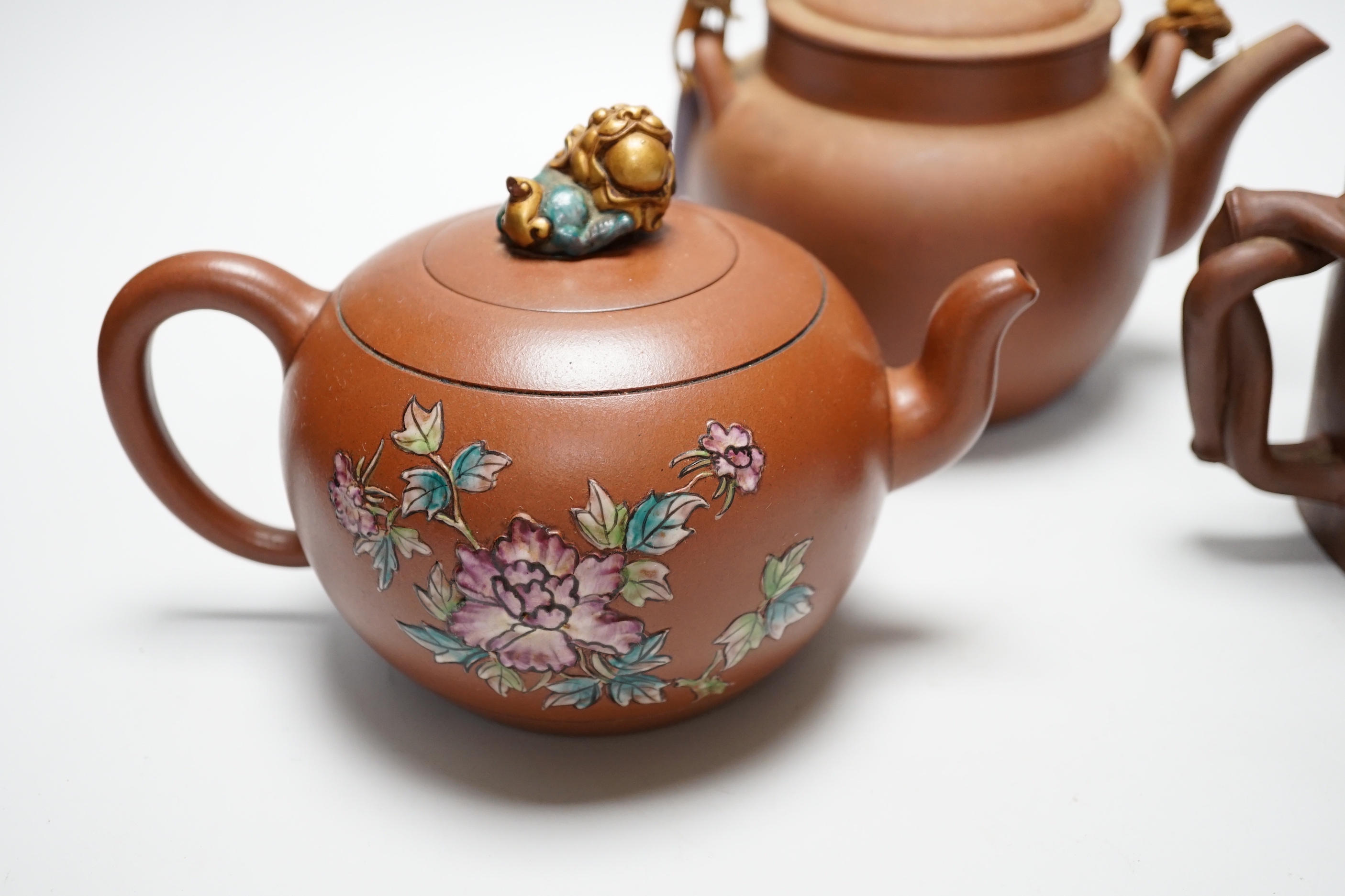 Four Chinese Yixing large terracotta teapots